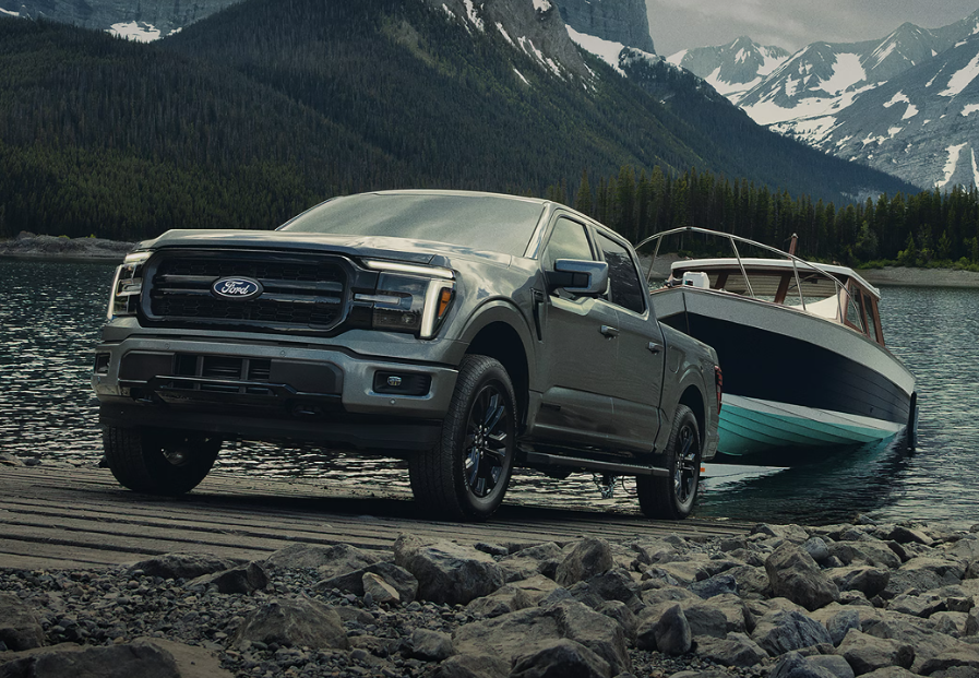 Gray 2026 Ford F-150 towing a boat