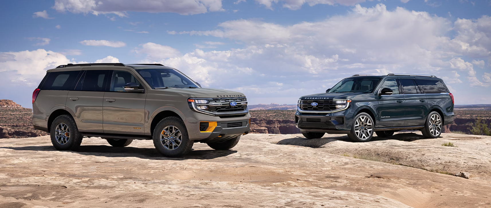 Two 2027 Ford Expeditions parked by cliff