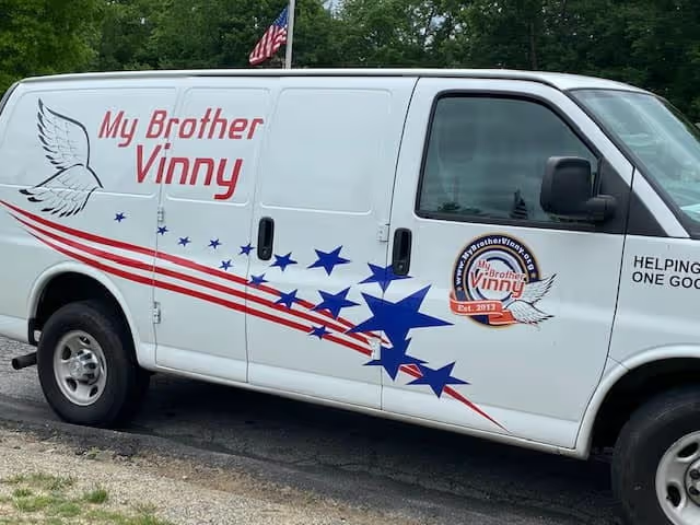 My Brother Vinny charity van with patriotic graphics.